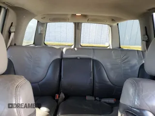 1999 GMC Denali z VIN 1GKEK13R4XR918005, wystawiony jako Copart lot #74964184 z przebiegiem 206 584 mil mil oraz Nie do naprawy. Historia ofert i sprzedaży dostępna na DreamBid. Obrazek 10.