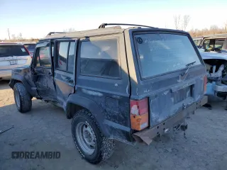 1996 Jeep Cherokee Sport with VIN 1J4FJ68S8TL244251, listed as a Copart auction lot 42321635 with 168,354 mi miles and Salvage Title. Bid and sale history available at carsss.com. Image 2.
