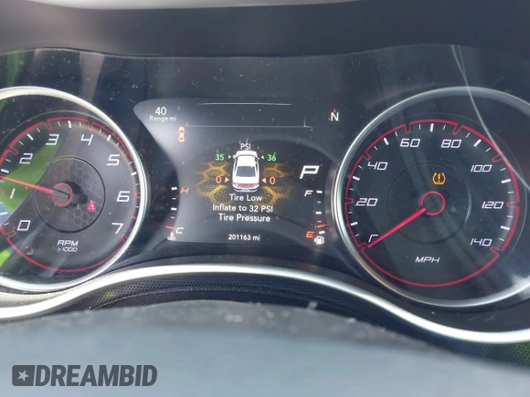 2015 Dodge Charger SXT with VIN 2C3CDXHG1FH866598, listed as a IAAI auction lot 41944761 with 201,163 mi miles and . Bid and sale history available at DreamBid. Image 7.