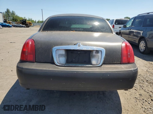 2001 Lincoln Town Car Cartier L z VIN 1LNHM85W71Y624315, wystawiony jako Copart lot #60479385 z przebiegiem 171 485 mil mil oraz Czysty tytuł • Clean title. Historia ofert i sprzedaży dostępna na DreamBid. Obrazek 6.