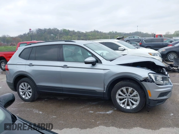 2019 Volkswagen Tiguan S with VIN 3VV1B7AX9KM110873, listed as a IAAI auction lot 42010931 with 82,745 mi miles and . Bid and sale history available at DreamBid. Image 13.