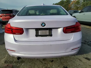 2018 BMW 3 Series 320i with VIN WBA8A9C55JAH12818, listed as a Copart auction lot 52110515 with 72,522 mi miles and Salvage title. Bid and sale history available at DreamBid. Image 6.