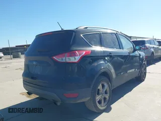 2016 Ford Escape SE with VIN 1FMCU0G99GUC19883, listed as a IAAI auction lot 41726858 with 156,863 mi miles. Bid and sale history available at carsss.com. Image 4.