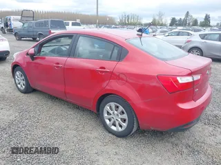 2013 Kia Rio LX with VIN KNADM4A30D6179274, listed as a IAAI auction lot 42014845 with 115,238 mi miles. Bid and sale history available at carsss.com. Image 3.