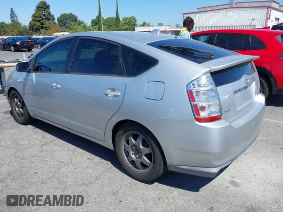2007 Toyota Prius with VIN JTDKB20U877677686, listed as a IAAI auction lot 42234436 with 240,763 mi miles and . Bid and sale history available at DreamBid. Image 3.