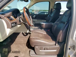 2011 Cadillac Escalade ESV Platinum z VIN 1GYS3KEF0BR265020, wystawiony jako Copart lot #52310575 z przebiegiem 122 949 mil mil oraz Czysty tytuł • Clean title. Historia ofert i sprzedaży dostępna na DreamBid. Obrazek 7.