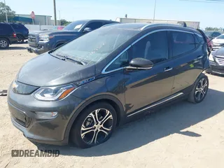 2018 Chevrolet Bolt EV Premier z VIN 1G1FX6S04J4116505, wystawiony jako IAAI lot #42258808 z przebiegiem 103 089 mil mil oraz . Historia ofert i sprzedaży dostępna na DreamBid. Obrazek 2.