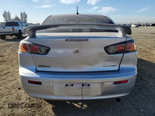 2015 Mitsubishi Lancer ES with VIN JA32U2FU4FU021260, listed as a Copart auction lot 77233514 with 99,548 mi miles and Salvage Title. Bid and sale history available at carsss.com. Image 6.