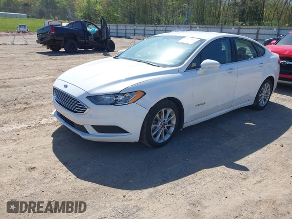 2017 Ford Fusion Hybrid SE z VIN 3FA6P0LU8HR396572, wystawiony jako IAAI lot #41997684 z przebiegiem 272 803 mil mil oraz . Historia ofert i sprzedaży dostępna na DreamBid. Obrazek 17.