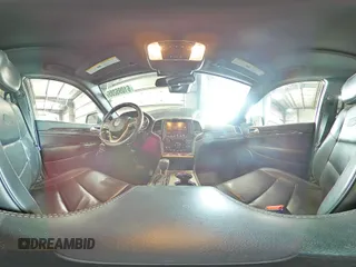 2016 Jeep Grand Cherokee Overland with VIN 1C4RJFCG9GC345309, listed as a Copart auction lot 61095285 with 115,968 mi miles and Salvage title. Bid and sale history available at DreamBid. Image 16.