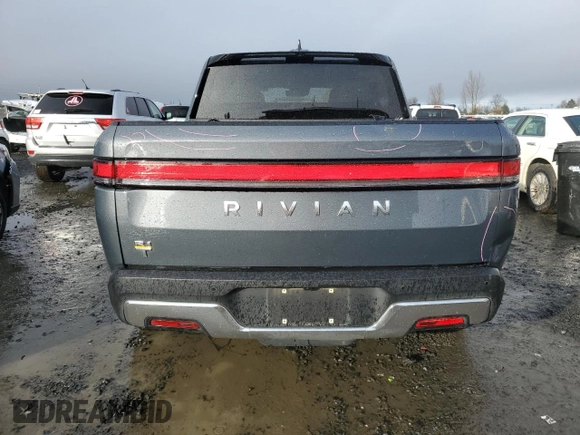 2022 Rivian R1T Adventure z VIN 7FCTGAAA5NN014941, wystawiony jako Copart lot #43771755 z przebiegiem 43 410 mil mil oraz Szkody całkowita. Historia ofert i sprzedaży dostępna na DreamBid. Obrazek 6.