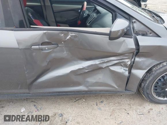 2012 Ford Focus SE with VIN 1FAHP3F24CL352340, listed as a IAAI auction lot 41118173 with 154,623 mi miles. Bid and sale history available at carsss.com. Image 13.