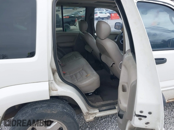 2002 Jeep Liberty Limited with VIN 1J4GL58K32W246480, listed as a IAAI auction lot 41832097 with 300,097 mi miles and . Bid and sale history available at carsss.com. Image 8.