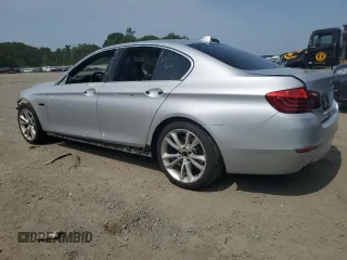 2014 BMW 5 Series 535i xDrive with VIN WBA5B3C5XED530918, listed as a Copart auction lot 60143395 with 104,784 mi miles and Clean title. Bid and sale history available at DreamBid. Image 2.