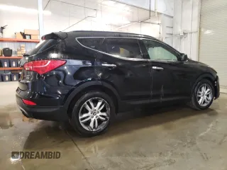 2013 Hyundai Santa Fe Sport z VIN 5XYZUDLA5DG076949, wystawiony jako Copart lot #55758515 z przebiegiem 168 636 mil mil oraz Szkoda całkowita • Salvage title. Historia ofert i sprzedaży dostępna na DreamBid. Obrazek 3.