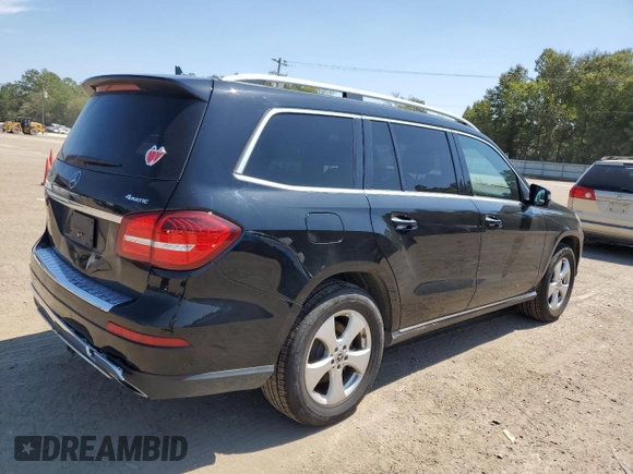 2018 Mercedes-Benz GLS with VIN 4JGDF6EE1JB084032, listed as a Copart auction lot 68464143 with 99,904 mi miles. Bid and sale history available at carsss.com. Image 3.