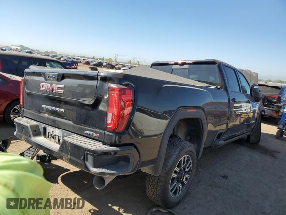2023 GMC Sierra 3500HD AT4 z VIN 1GT49VEY1PF260918, wystawiony jako Copart lot #72765654 z przebiegiem 13 596 mil mil oraz Szkoda całkowita • Salvage title. Historia ofert i sprzedaży dostępna na DreamBid. Obrazek 3.