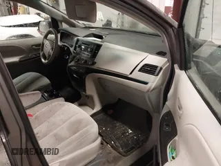 2011 Toyota Sienna LE with VIN 5TDJK3DC2BS013045, listed as a IAAI auction lot 41127037 with 239,401 mi miles. Bid and sale history available at carsss.com. Image 5.
