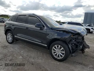 2017 Volkswagen Touareg Sport with VIN WVGEF7BP2HD000699, listed as a Copart auction lot 47234685 with Not Provided miles and Salvage Title. Bid and sale history available at DreamBid. Image 4.