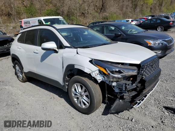 2022 Toyota Corolla Cross LE with VIN 7MUCAABG2NV024823, listed as a Copart auction lot 53458775 with 24,562 mi miles and Non repairable. Bid and sale history available at DreamBid. Image 4.