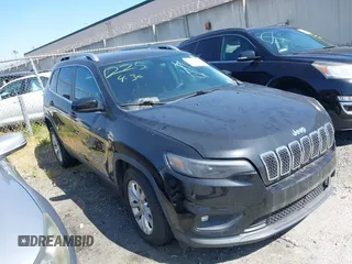 2019 Jeep Cherokee Latitude with VIN 1C4PJLCB2KD331698, listed as a IAAI auction lot 41175485 with 85,821 mi miles. Bid and sale history available at carsss.com. Image 1.