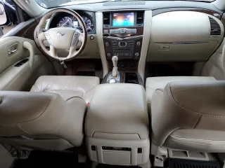2015 Infiniti QX80 with VIN JN8AZ2NC7F9370623, listed as a Copart auction lot 66523254 with 140,653 mi miles and Salvage Title. Bid and sale history available at carsss.com. Image 8.
