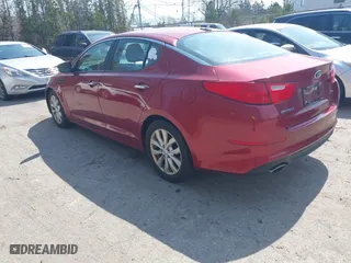 2014 Kia Optima LX with VIN 5XXGM4A77EG326177, listed as a IAAI auction lot 42088542 with 164,237 mi miles. Bid and sale history available at carsss.com. Image 3.