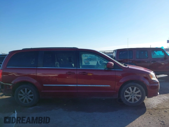 2013 Chrysler Town & Country Touring with VIN 2C4RC1BG2DR758951, listed as a IAAI auction lot 41136184 with 134,784 mi miles. Bid and sale history available at carsss.com. Image 13.