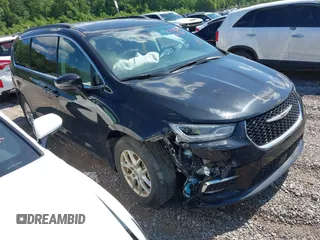 2022 Chrysler Pacifica Touring L with VIN 2C4RC1BG3NR106311, listed as a IAAI auction lot 42158651 with 68,473 mi miles and . Bid and sale history available at DreamBid. Image 1.