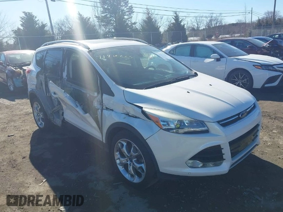 2016 Ford Escape Titanium with VIN 1FMCU9J96GUB65441, listed as a IAAI auction lot 41412223 with 74,218 mi miles. Bid and sale history available at carsss.com. Image 1.