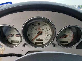 1999 Mercedes-Benz SLK-Class with VIN WDBKK47F0XF132802, listed as a Copart auction lot 69818544 with 123,026 mi miles and Salvage Title. Bid and sale history available at carsss.com. Image 9.