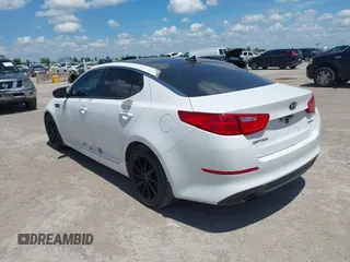 2015 Kia Optima EX with VIN 5XXGN4A77FG369058, listed as a IAAI auction lot 42621804 with 183,635 mi miles and . Bid and sale history available at DreamBid. Image 3.