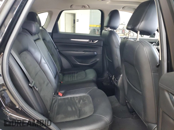 2019 Mazda CX-5 Touring with VIN JM3KFBCM4K0571793, listed as a Copart auction lot 49696825 with 97,305 mi miles and Salvage Title. Bid and sale history available at carsss.com. Image 11.