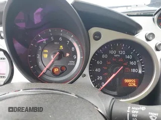 2020 Nissan 370Z Sport z VIN JN1AZ4EH6LM823399, wystawiony jako IAAI lot #42135621 z przebiegiem 98 855 mil mil oraz . Historia ofert i sprzedaży dostępna na DreamBid. Obrazek 7.
