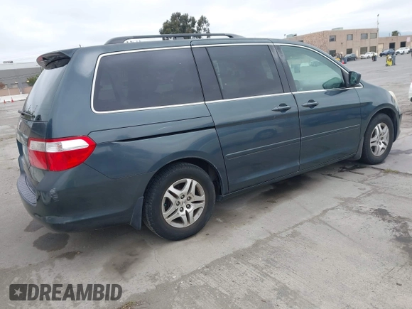 2006 Honda Odyssey EX-L with VIN 5FNRL38786B019441, listed as a IAAI auction lot 42074209 with 184,008 mi miles. Bid and sale history available at carsss.com. Image 4.