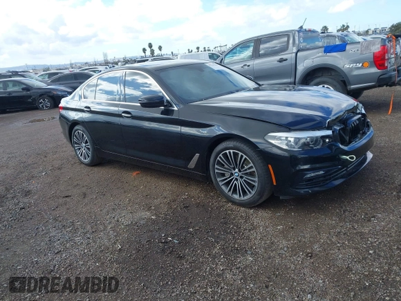 2018 BMW 5 Series 530i z VIN WBAJA5C54JWA38285, wystawiony jako IAAI lot #41390399 z przebiegiem 74 840 mil mil oraz . Historia ofert i sprzedaży dostępna na DreamBid. Obrazek 1.