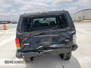 1998 Jeep Cherokee Sport z VIN 1J4FJ68S8WL193483, wystawiony jako Copart lot #58368705 z przebiegiem 94 462 mil mil oraz Szkoda całkowita • Salvage title. Historia ofert i sprzedaży dostępna na DreamBid. Obrazek 6.