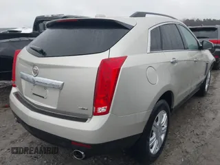 2015 Cadillac SRX with VIN 3GYFNAE37FS536363, listed as a IAAI auction lot 41551790 with 48,422 mi miles and . Bid and sale history available at DreamBid. Image 4.