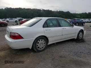 2004 Acura RL w/Navigation System z VIN JH4KA96674C007925, wystawiony jako Copart lot #56732645 z przebiegiem 188 312 mil mil oraz Szkoda całkowita • Salvage title. Historia ofert i sprzedaży dostępna na DreamBid. Obrazek 3.