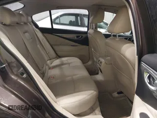 2015 Infiniti Q50 Premium z VIN JN1BV7ARXFM418280, wystawiony jako IAAI lot #42080879 z przebiegiem 126 411 mil mil oraz . Historia ofert i sprzedaży dostępna na DreamBid. Obrazek 8.
