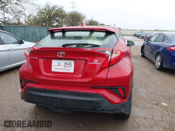 2020 Toyota C-HR LE with VIN JTNKHMBX4L1067648, listed as a IAAI auction lot 41556302 with 64,698 mi miles. Bid and sale history available at carsss.com. Image 15.
