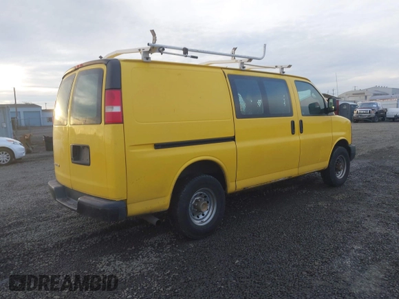 2014 Chevrolet Express Cargo Van with VIN 1GCWGFCA7E1150041, listed as a IAAI auction lot 41387426 with 185,480 mi miles. Bid and sale history available at carsss.com. Image 4.