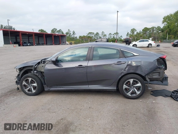 2019 Honda Civic Sedan LX with VIN 19XFC2F66KE024399, listed as a IAAI auction lot 42023498 with 50,173 mi miles. Bid and sale history available at carsss.com. Image 14.