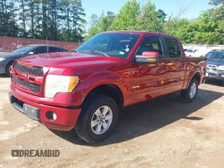 2013 Ford F-150 XL with VIN 1FTFW1CTXDKE10528, listed as a IAAI auction lot 42083987 with 330,837 mi miles. Bid and sale history available at carsss.com. Image 2.