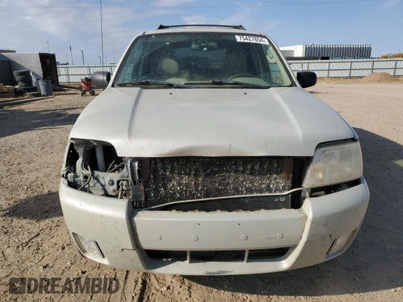 2007 Mercury Mariner Luxury с VIN 4M2CU91157KJ03937, выставлен на аукционе Copart как лот 75427854 с пробегом 141 784 миль миль и На запчасти • Non repairable. История ставок и продаж доступна на DreamBid. Изображение 5.