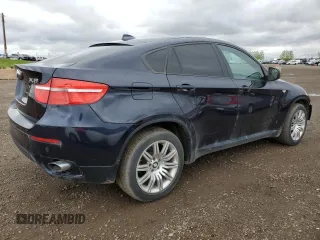 2012 BMW X6 35i z VIN 5UXFG2C55CL780183, wystawiony jako Copart lot #57357295 z przebiegiem 173 748 mil mil oraz Czysty tytuł • Clean title. Historia ofert i sprzedaży dostępna na DreamBid. Obrazek 3.
