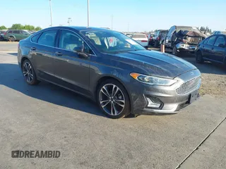2019 Ford Fusion Titanium with VIN 3FA6P0K98KR178636, listed as a IAAI auction lot 40927419 with 59,721 mi miles and . Bid and sale history available at DreamBid. Image 1.