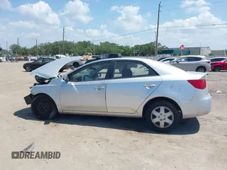 2010 Kia Forte LX with VIN KNAFT4A27A5080973, listed as a IAAI auction lot 42012776 with 244,485 mi miles. Bid and sale history available at carsss.com. Image 13.