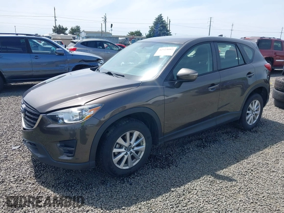 2016 Mazda CX-5 Sport with VIN JM3KE4BY8G0785812, listed as a IAAI auction lot 42324083 with 57,405 mi miles and . Bid and sale history available at DreamBid. Image 17.