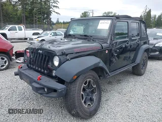 2015 Jeep Wrangler Unlimited Rubicon Hard Rock with VIN 1C4HJWFG6FL757421, listed as a IAAI auction lot 42107514 with 63,997 mi miles and . Bid and sale history available at DreamBid. Image 19.